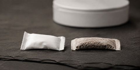 White nicotine pouch compared with a traditional tobacco snus portion
