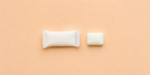 Nicotine pouch compared with a piece of nicotine gum