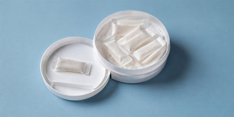 Nicotine pouch can with a separate lid compartment for used pouches