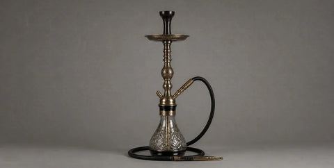 Traditional shisha water pipe on a plain grey background