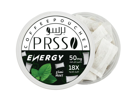 A round clear plastic tub of PRSS Energy Coffee Pouches, showing the white lid with black and green branding and mint leaves, next to the open tub containing white coffee pouches.